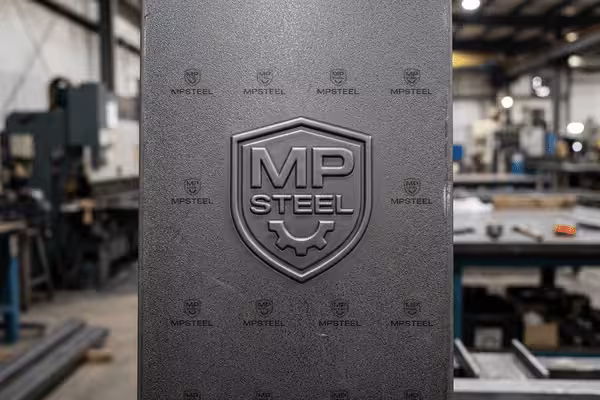 Embossed logo steel sheet