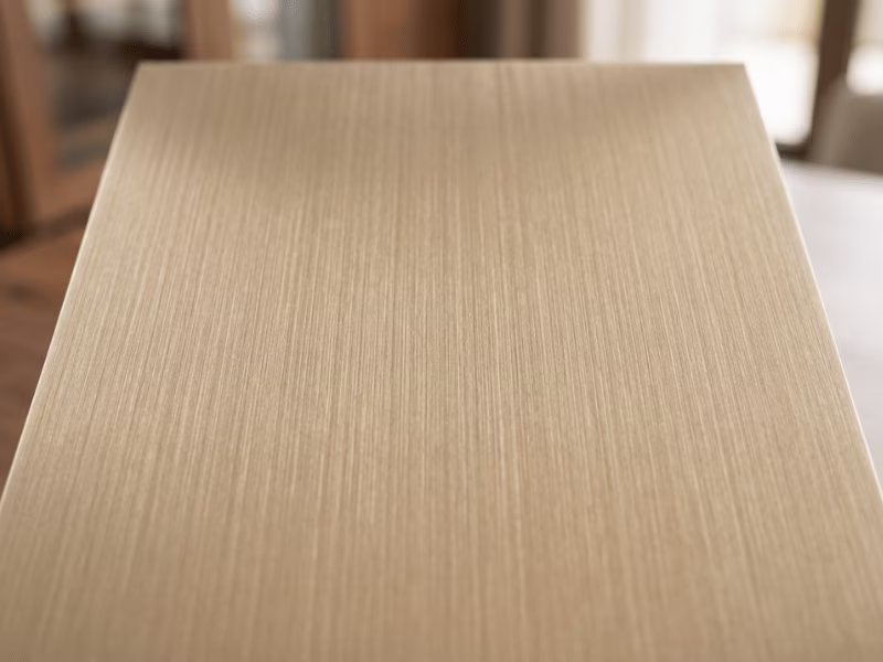 Champagne hairline finish steel sheet — warm toned directional brushed surface on PPGI substrate