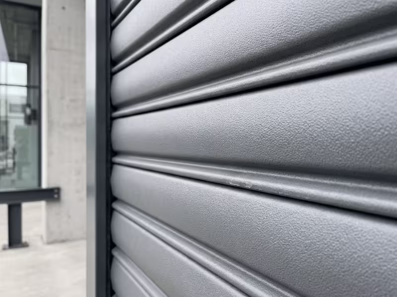 Embossed roller shutter slats