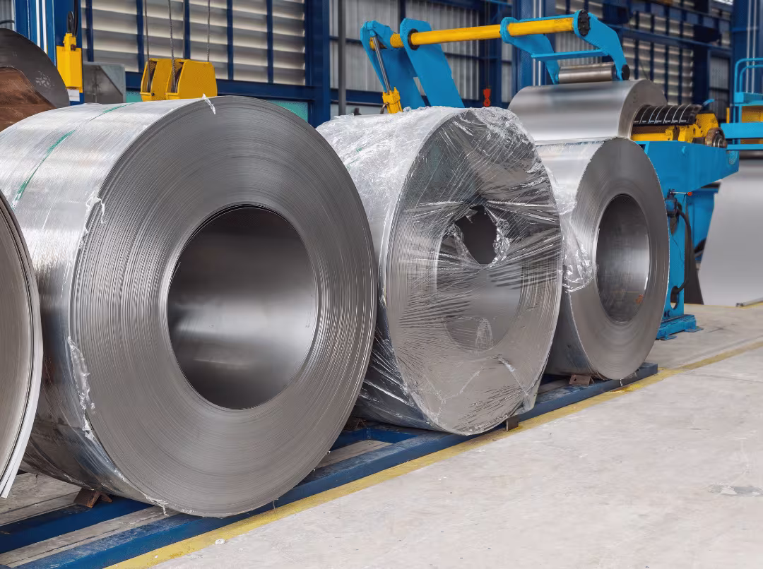 Stacked galvanized steel sheets with visible zinc spangle coating