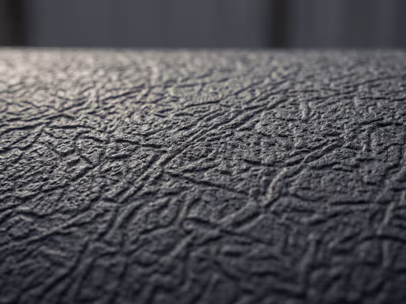 Textured wrinkle finish steel panel macro shot