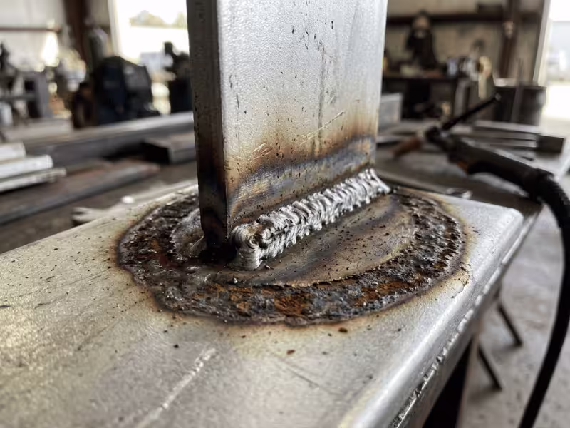Weld zone on aluminized steel with burned off coating and rust Weld zone on aluminized steel with burned off coating and rust